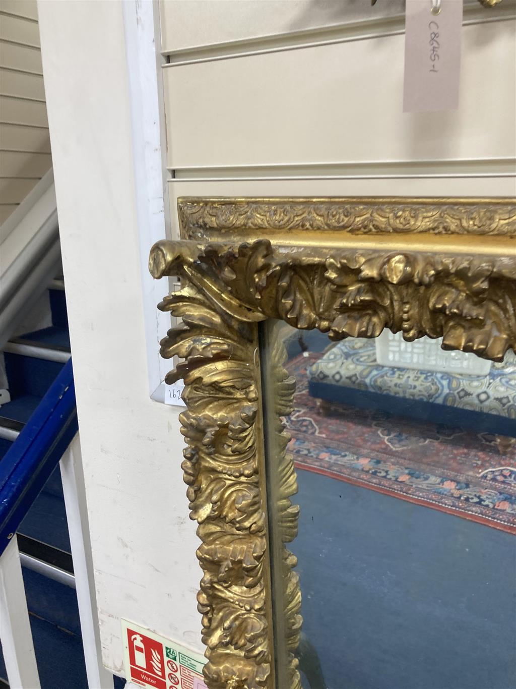 A rectangular giltwood and gesso wall mirror, width 100cm, height 86cm